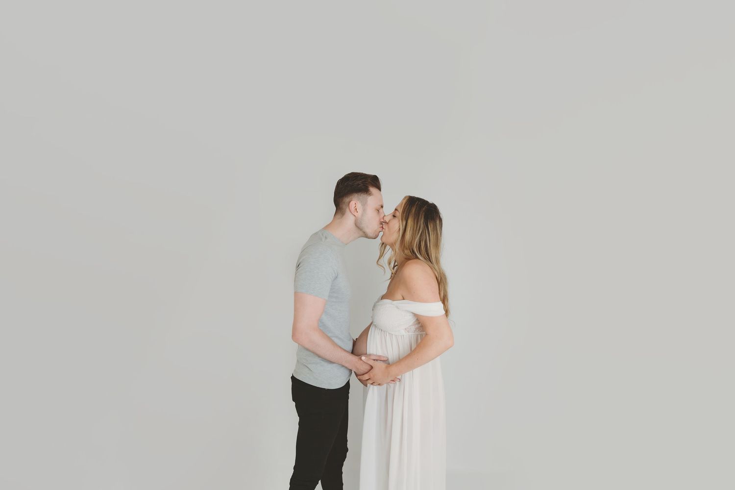 Intimate couple photoshoot with romantic poses in studio setting. Photographer. Hull. East Yorkshire. Photography