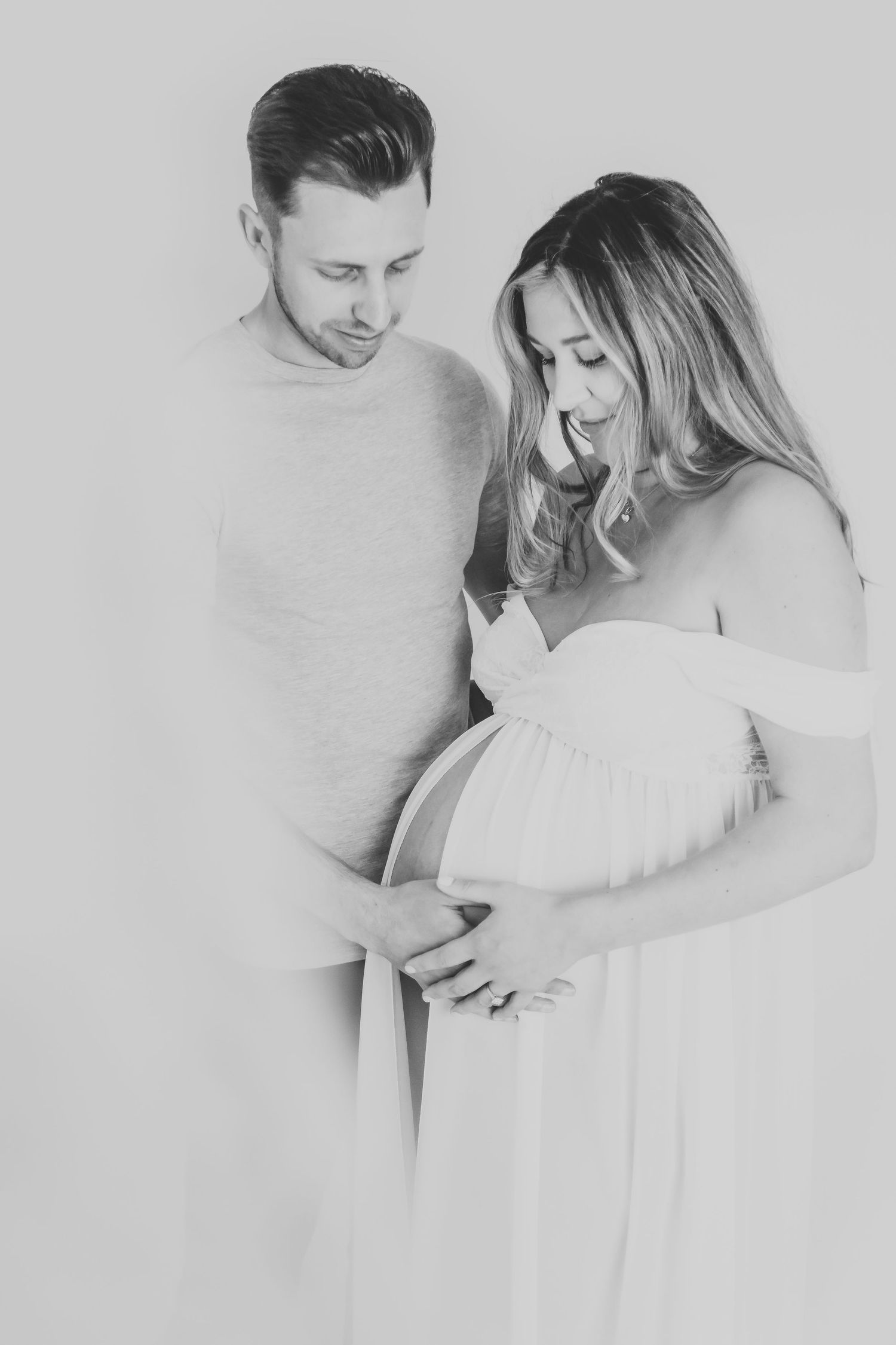 Artistic black and white maternity session with couple embracing. Photographer. Hull. East Yorkshire. Photography
