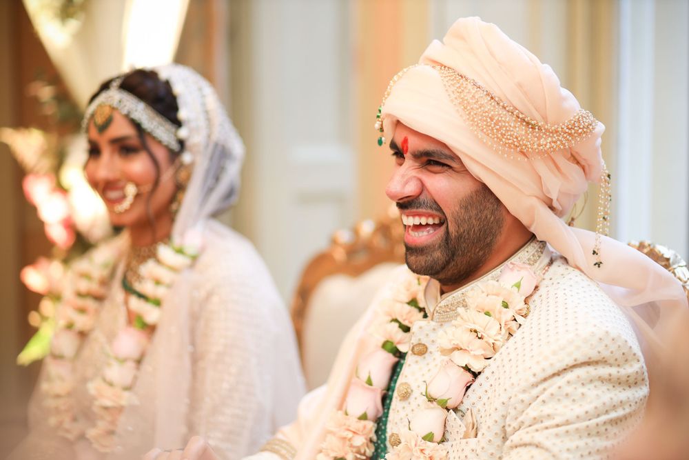 Wedding ceremony capturing joyful moments in traditional South Asian attire. Asian Wedding Photography & Videography