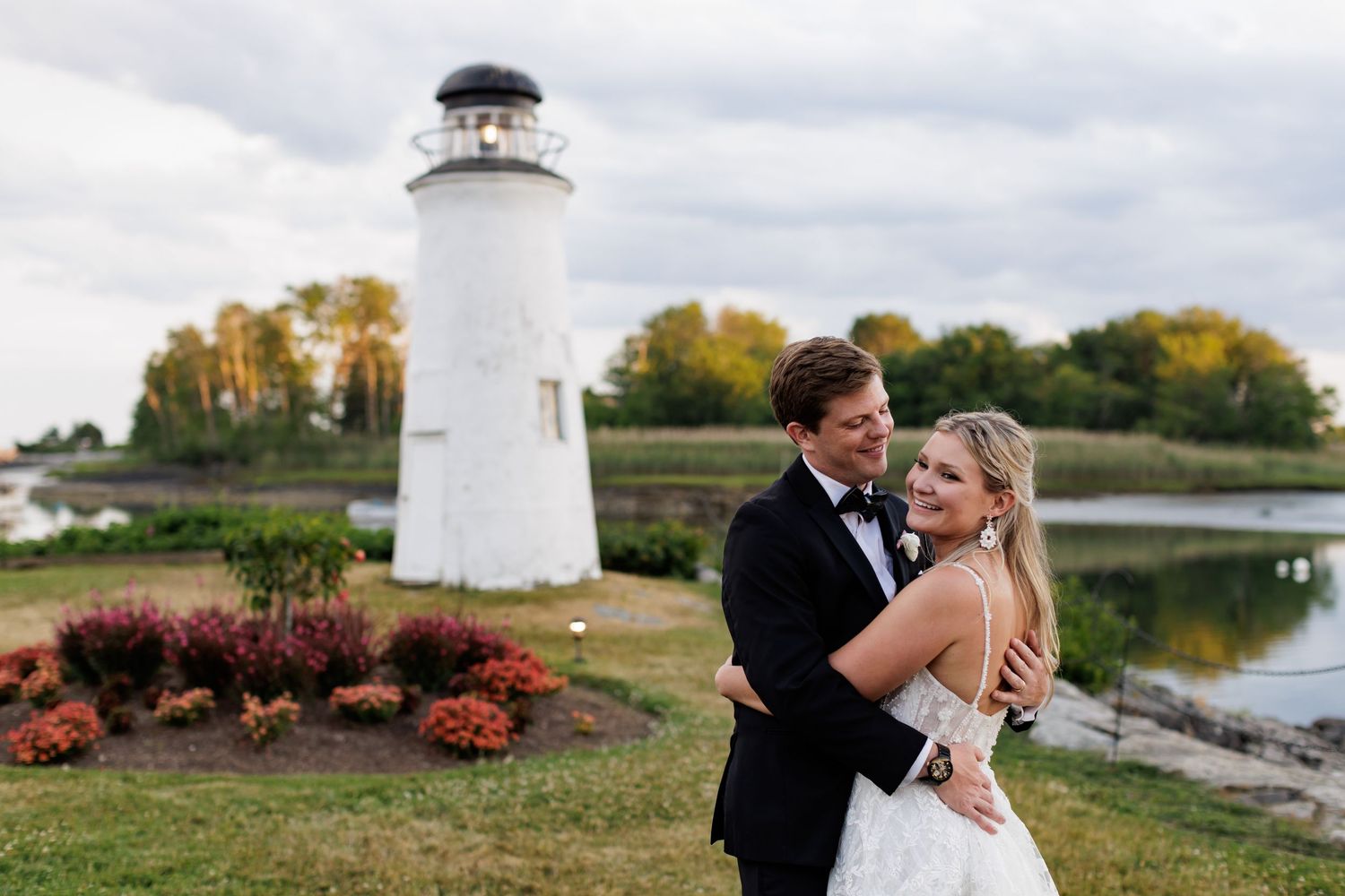 Photo of bride and groom on the coast of Maine in a wedding photography documentary style
