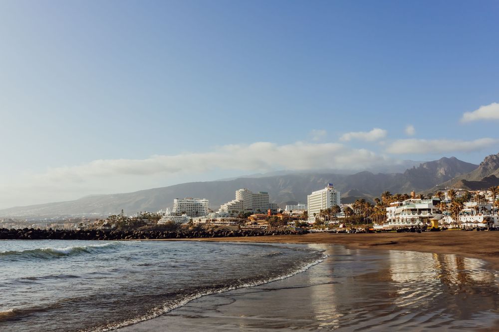 The turquoise sea at Tenerife, reflecting calm and beauty during a relaxing holiday walk.