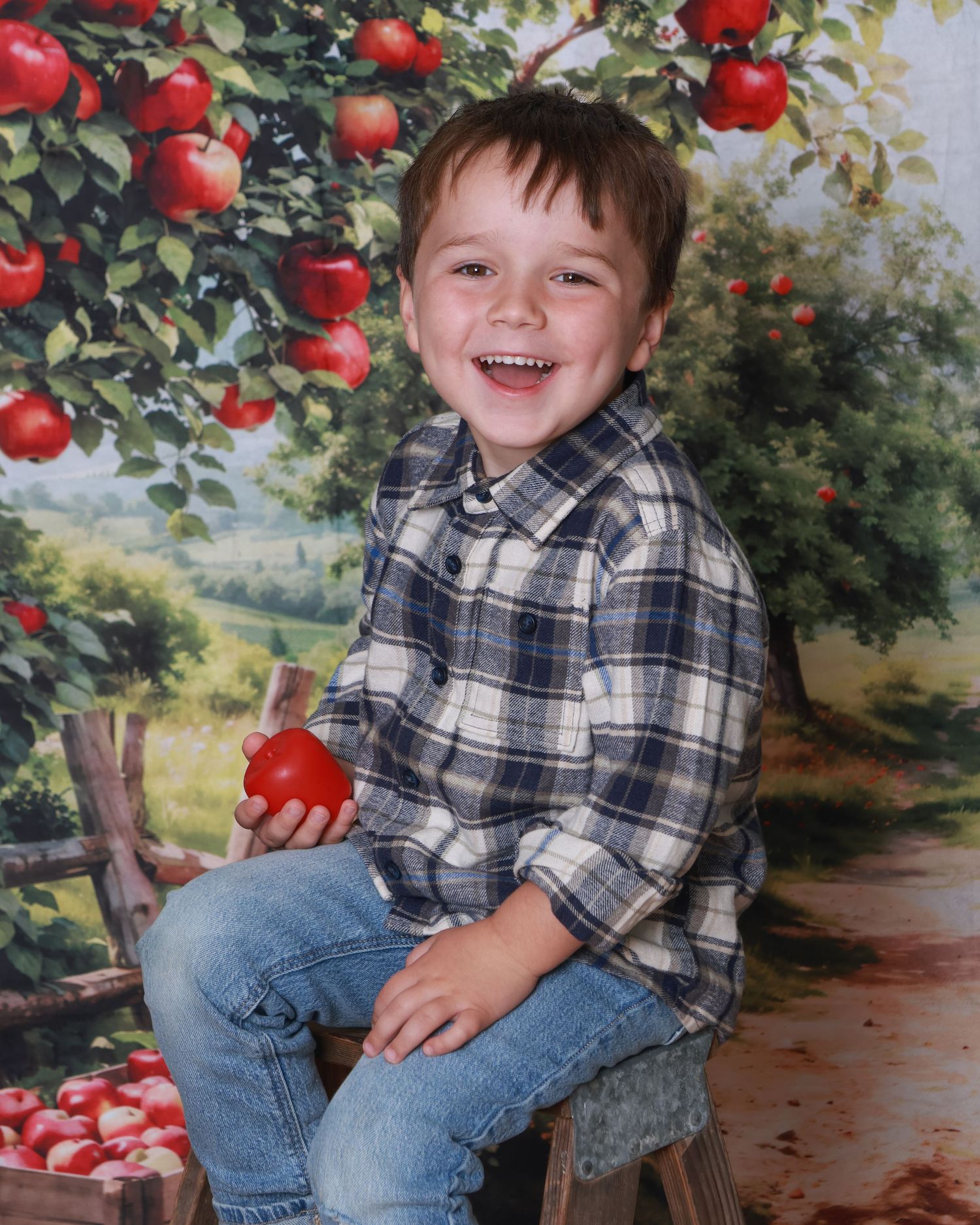 Children smiling naturally during school photo session in Miramichi studio