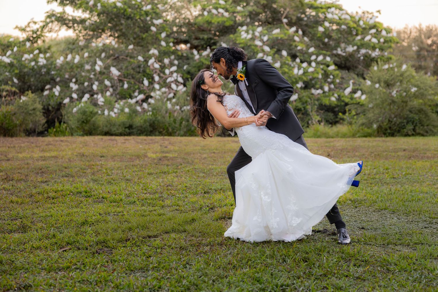 Bride and groom doing dip pose at Long Key Natural Area & Nature Center