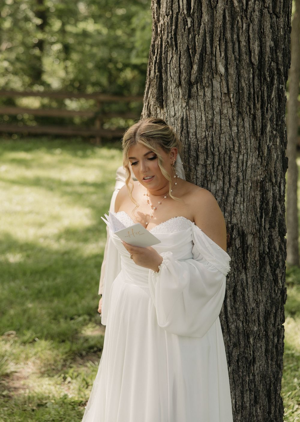 A series of photos showing a bride in a white dress peeking out from behind a large tree trunk in a sunlit garden setting.