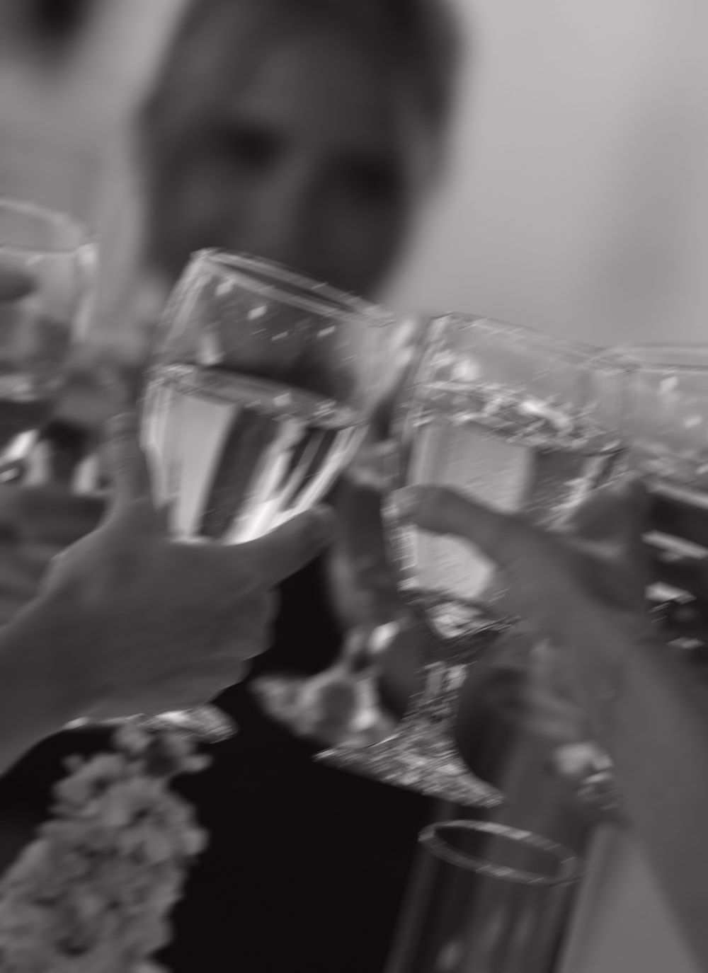 A blurry black and white sequence of six abstract photos showing motion and movement in an interior setting.