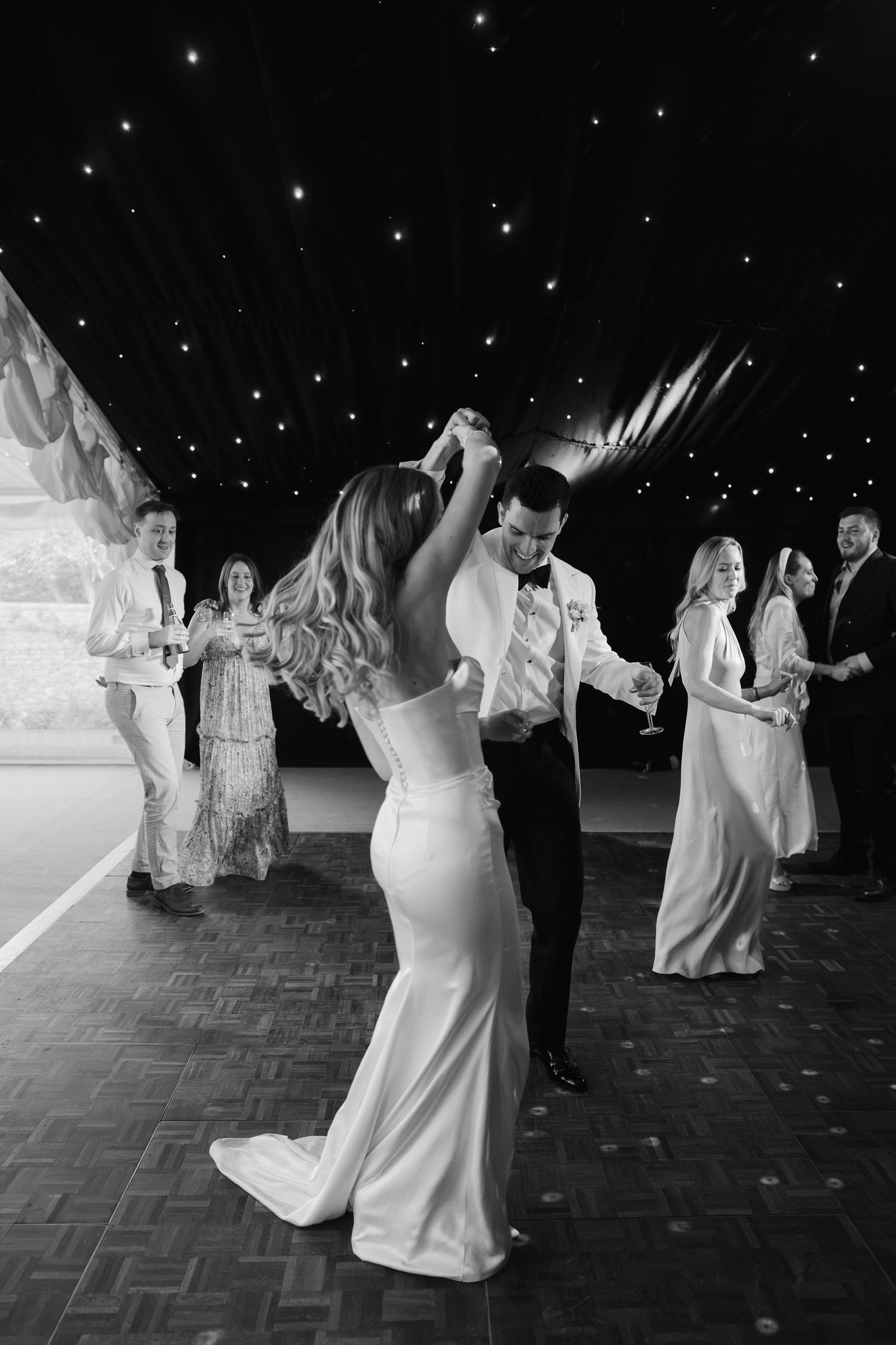 wedding guests dancing on dance floor at hamswell house wedding in bath