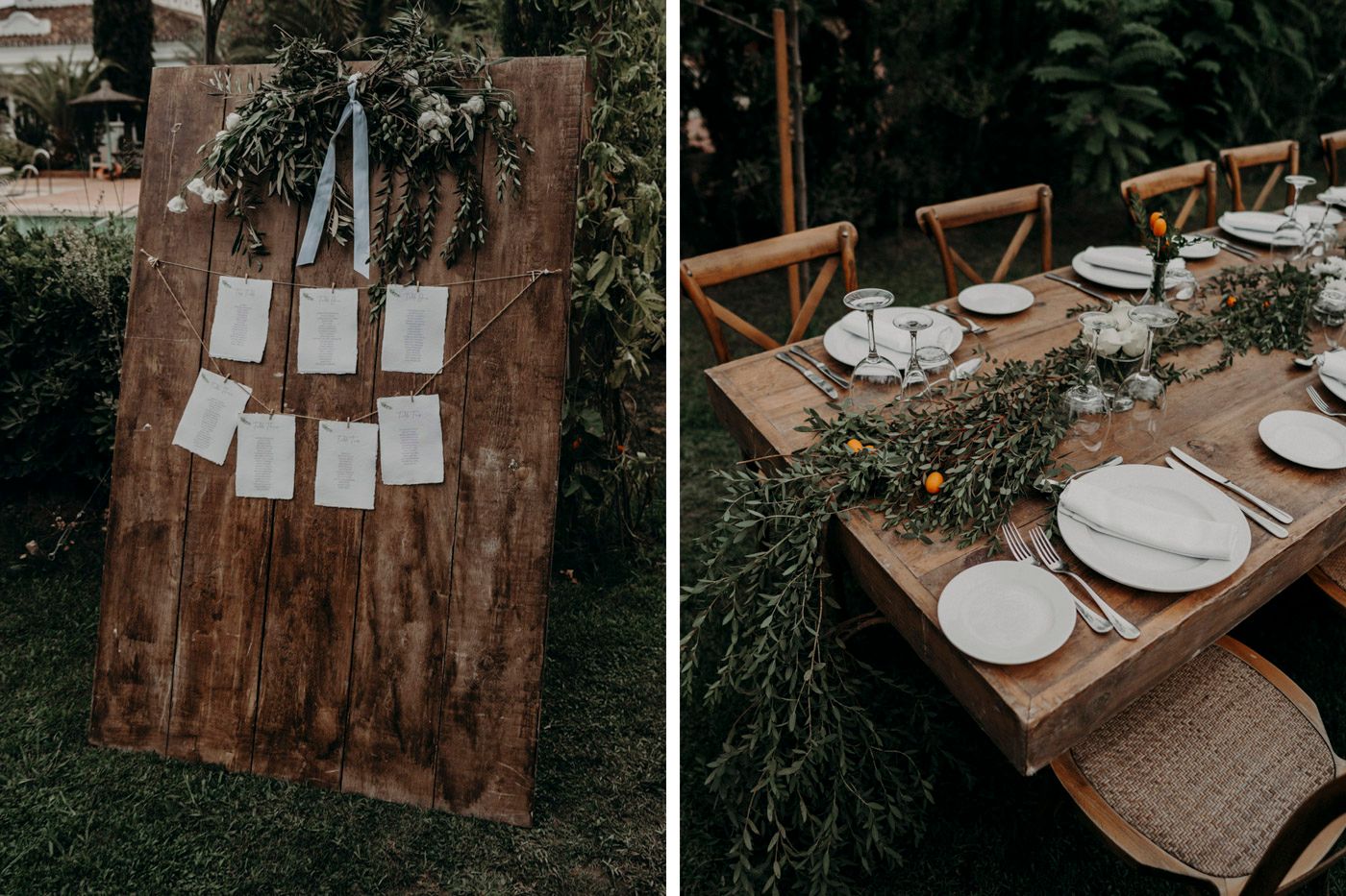 Rustic outdoor wedding setup with wooden seating chart board and elegant table settings decorated with greenery.