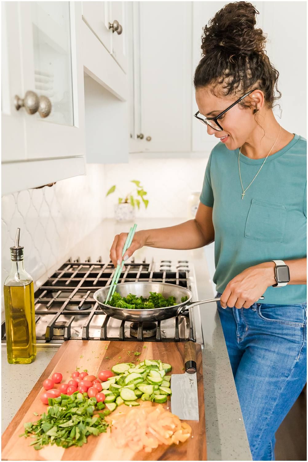 Woman preparing healthy food at kitchen stove