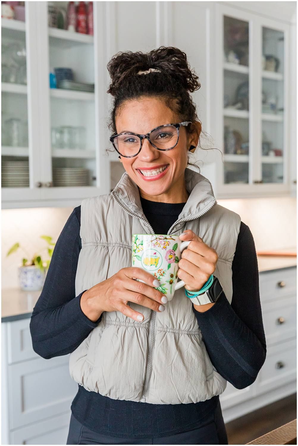 Portrait of woman holding coffee mug