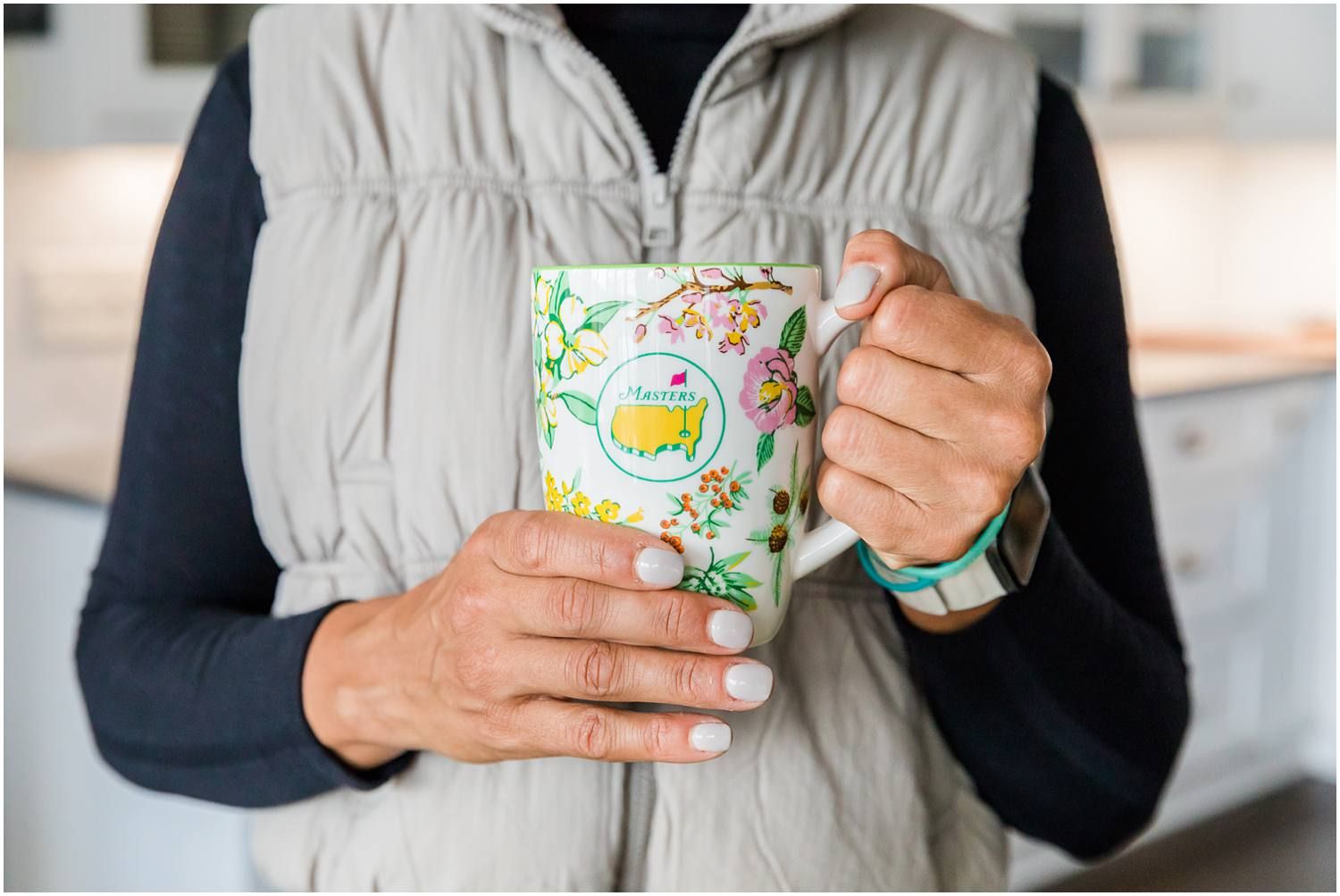 Closeup image of woman holding coffee mug