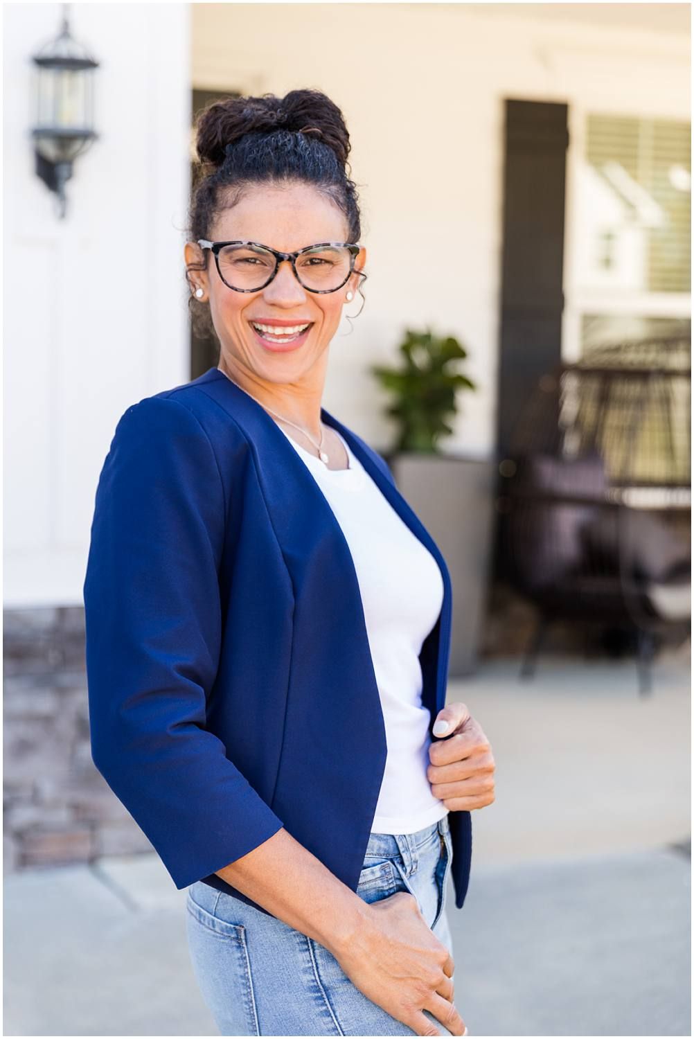 Woman posing in blue blazer