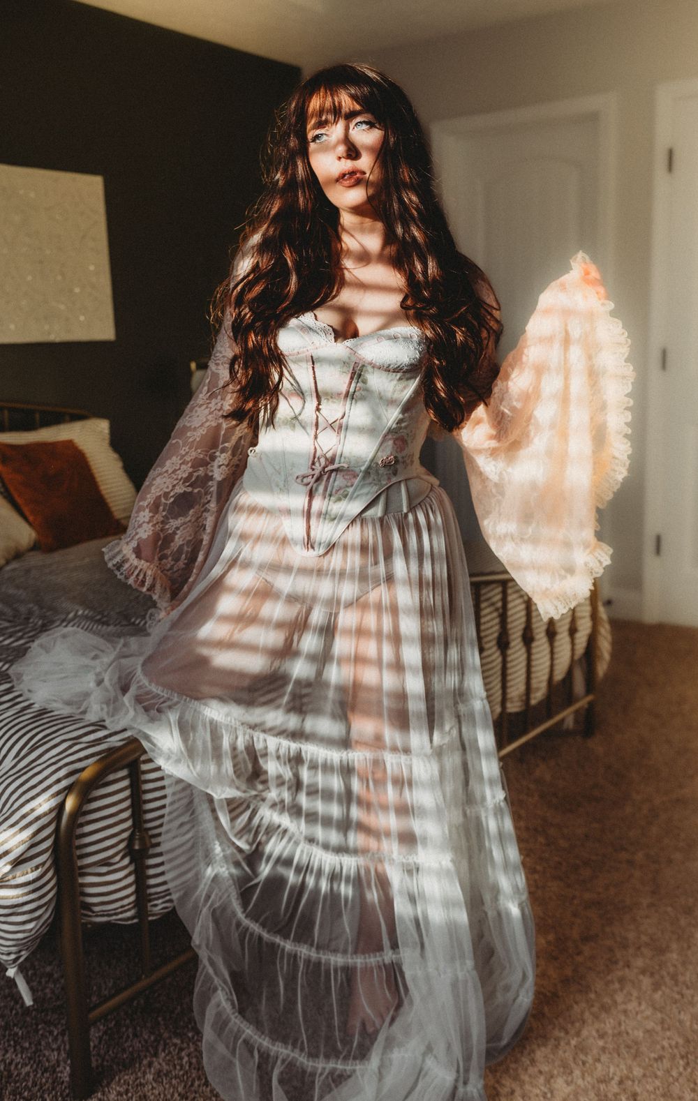 A series of dreamy photos showing a person in a white dress twirling with sunlight creating dramatic shadow patterns.