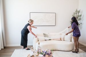 A series of progressive images showing someone cleaning and organizing a white minimalist room.