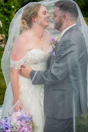 A romantic wedding moment captured in a series of candid shots showing laughter and joy with purple floral bouquet accents.