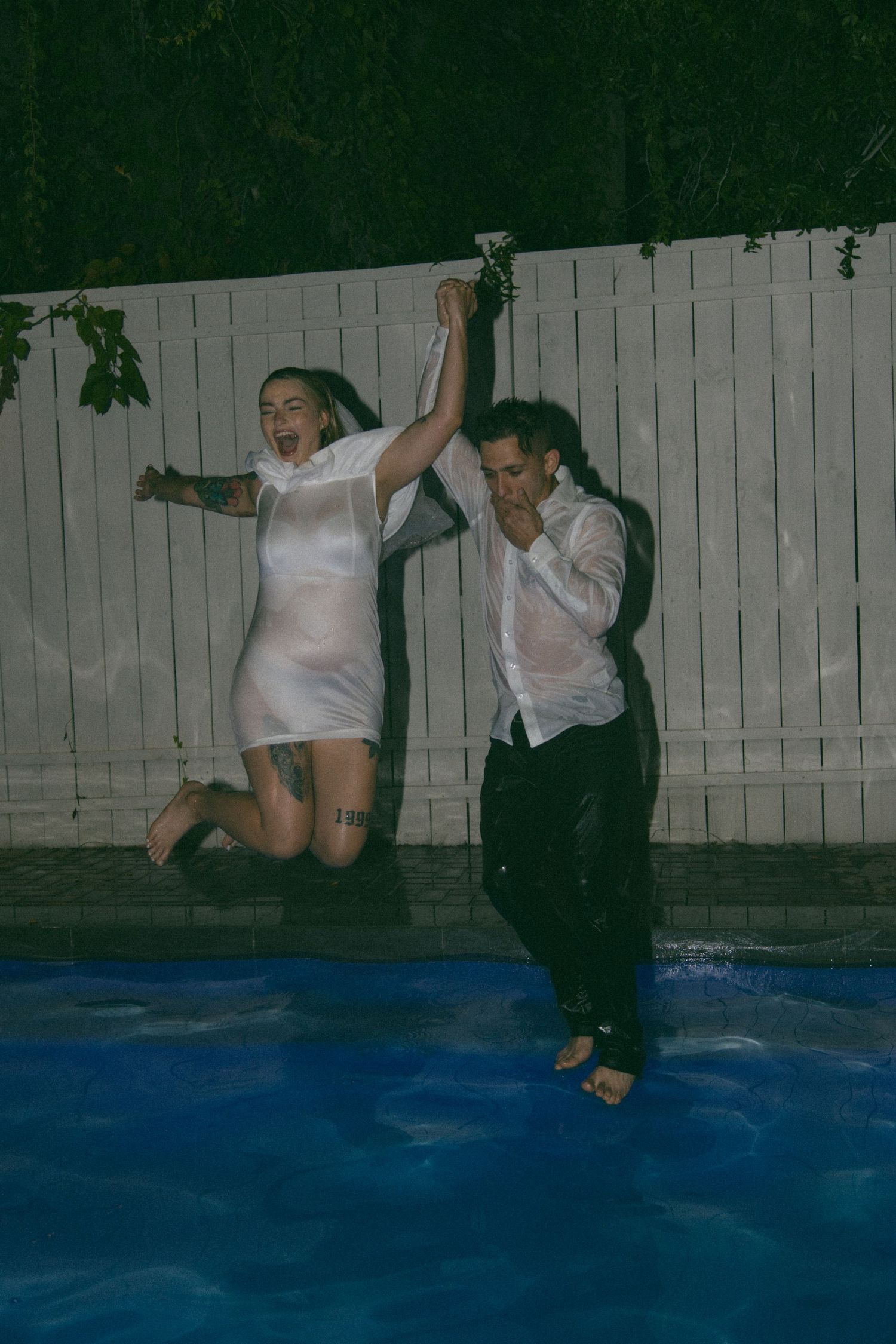 jumping in pool tub wedding day elopement unique adventurous romantic moody NC SC GA TN private fun couple