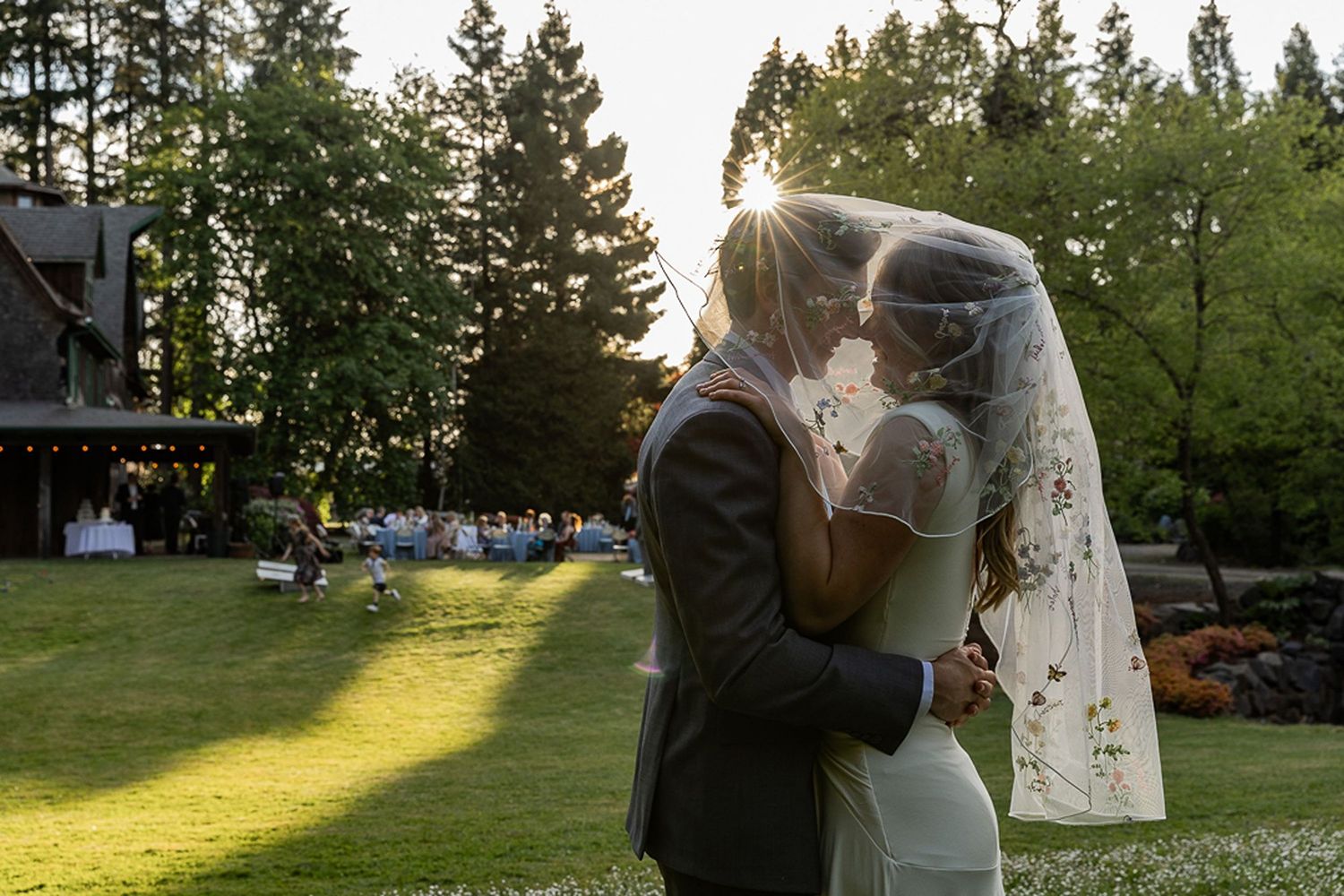 Golden hour photo of bride and groom during a wedding reception at Ogren Gardens in Eugene, Oregon.