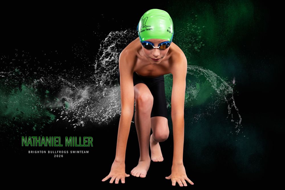 Young swimmer Nathaniel Miller of Brighton Bullfrogs poses in starting position wearing green swim cap and goggles.
