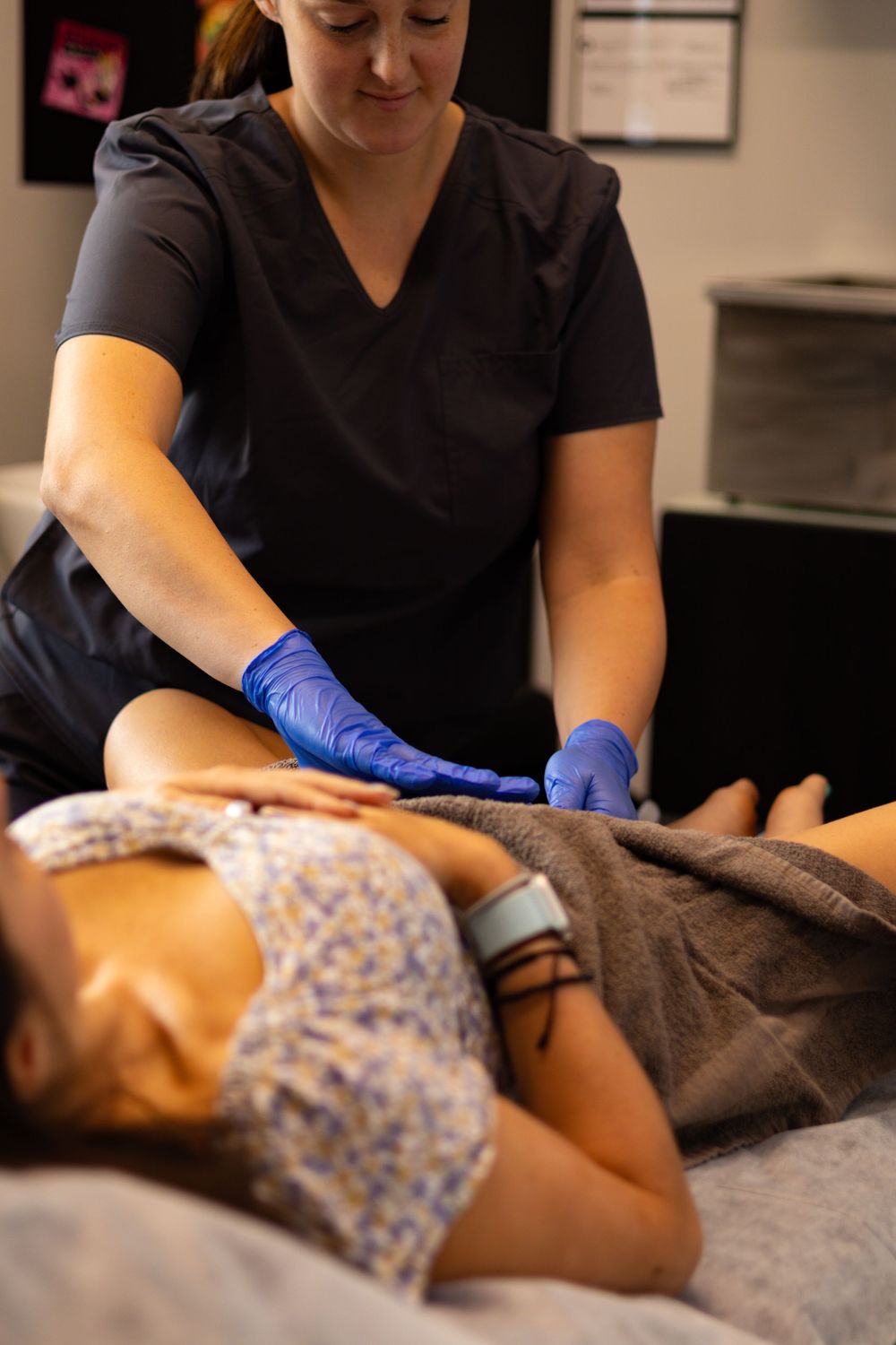 Professional performing delicate facial procedure in a medical spa setting.