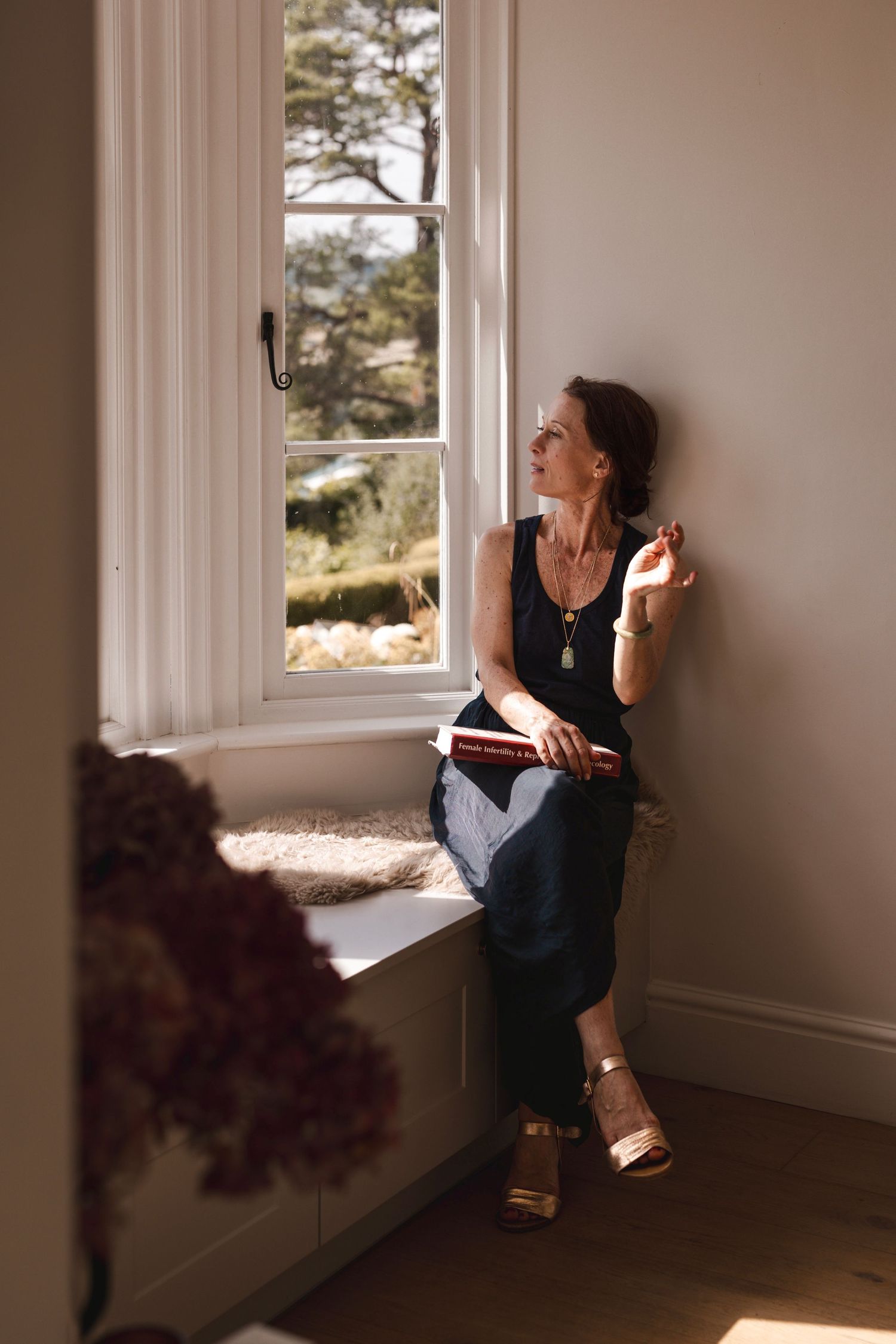 Editorial business branding photo of acupuncturist in her home in Box.