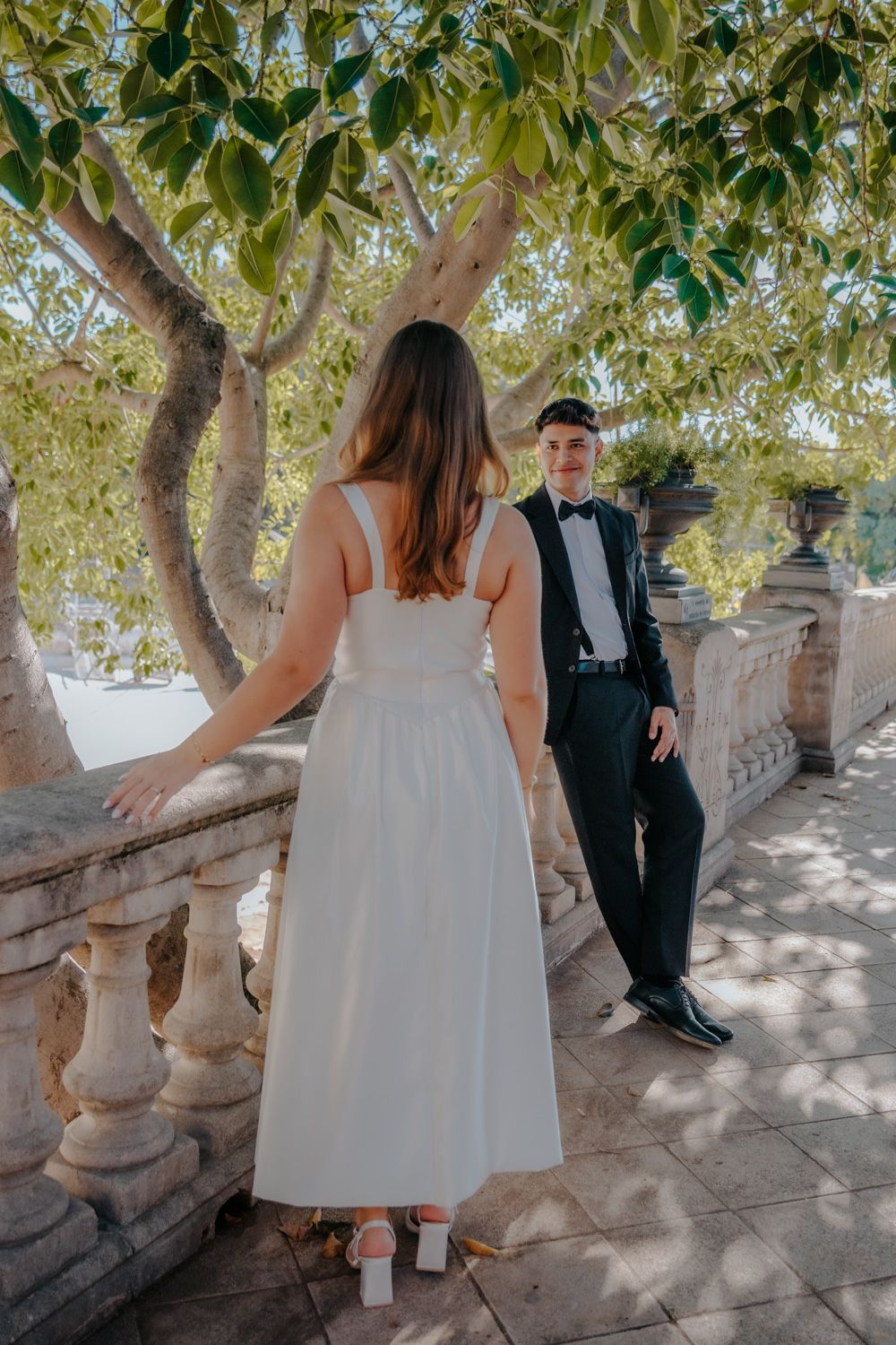 Intimate moment beside palm trees Barcelona Natural couples photoshoot BarcelonaLoversPH