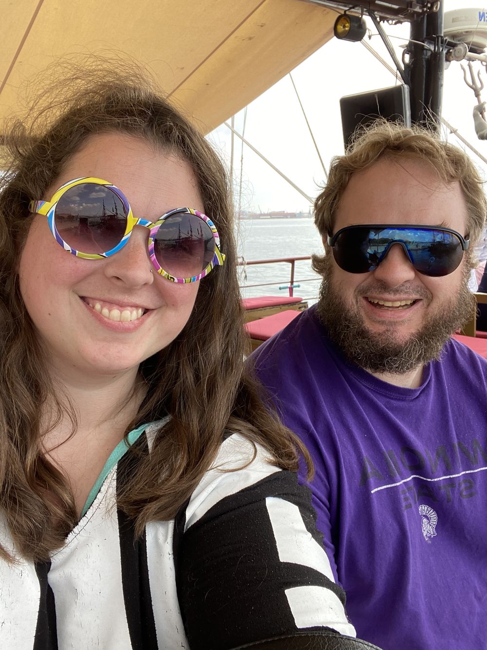 A series of selfie photos showing two people wearing sunglasses and smiling together in various poses.
