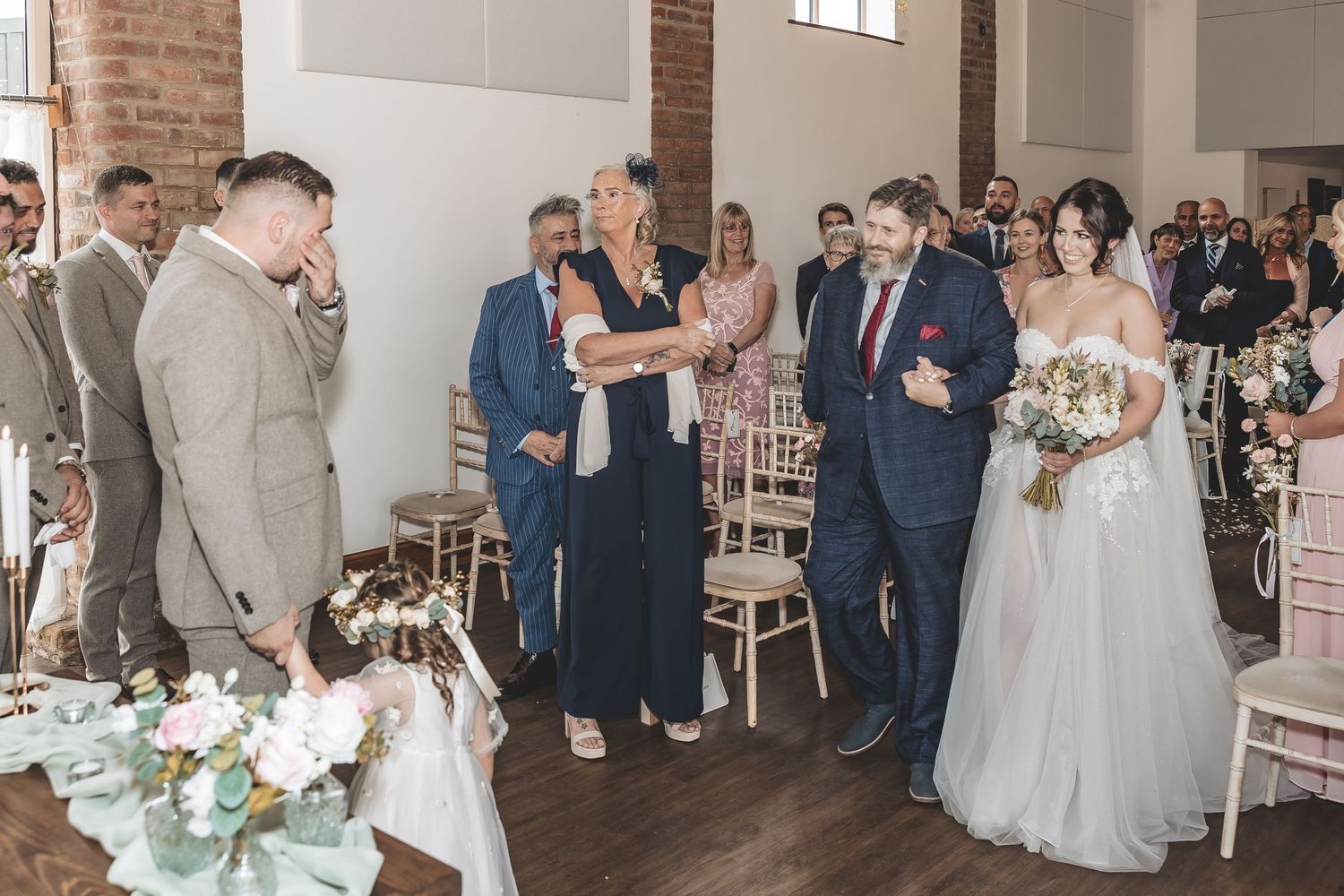 Capturing the natural emotions and atmosphere on a wedding day.
