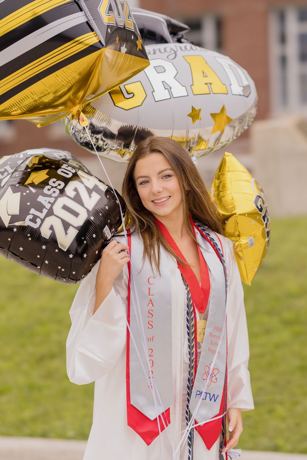 High school senior cap and gown at Fort Hill  School Cumberland Maryland by senior photographer Karen Morgan Photography