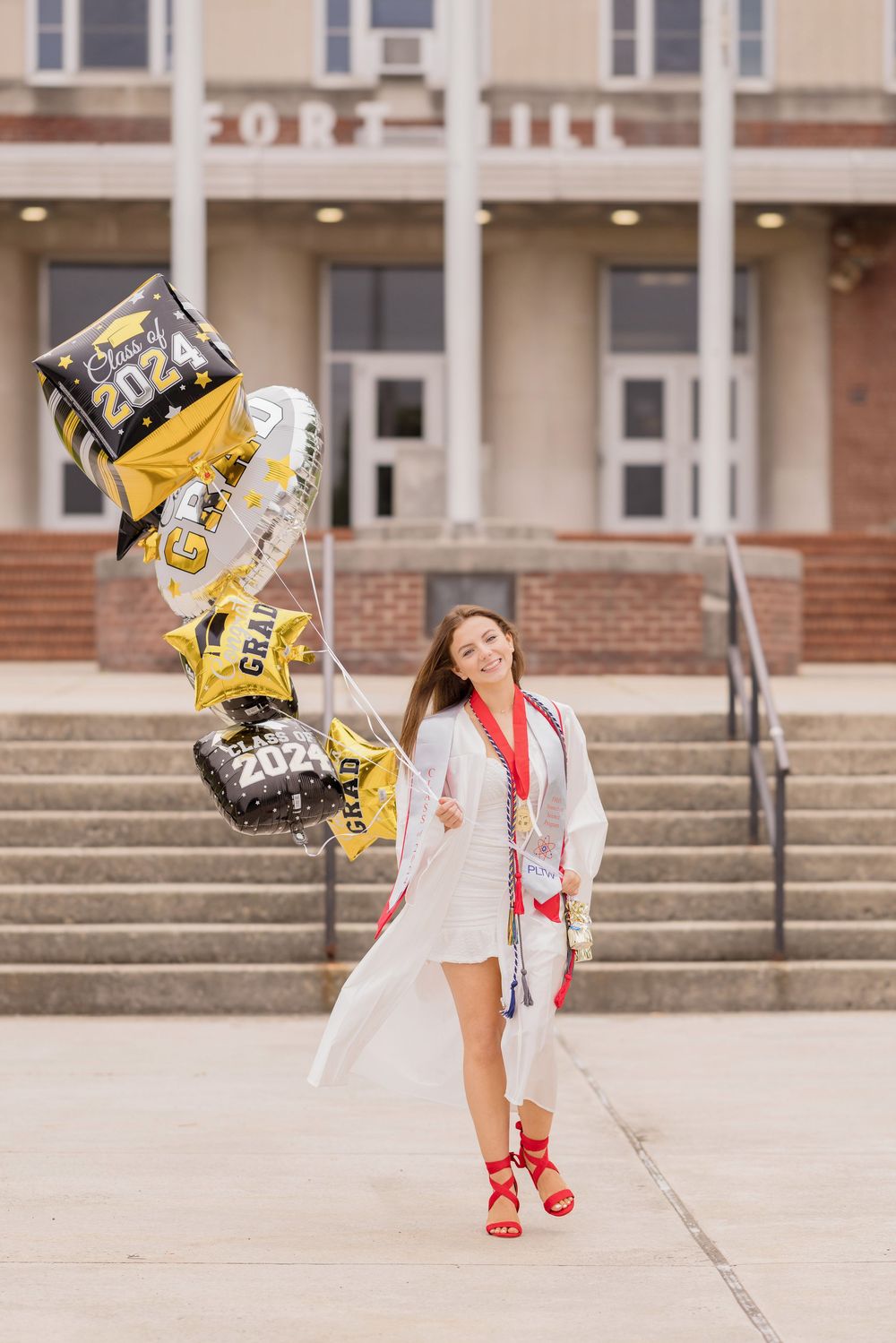 High school senior cap and gown at Fort Hill  School Cumberland Maryland by senior photographer Karen Morgan Photography