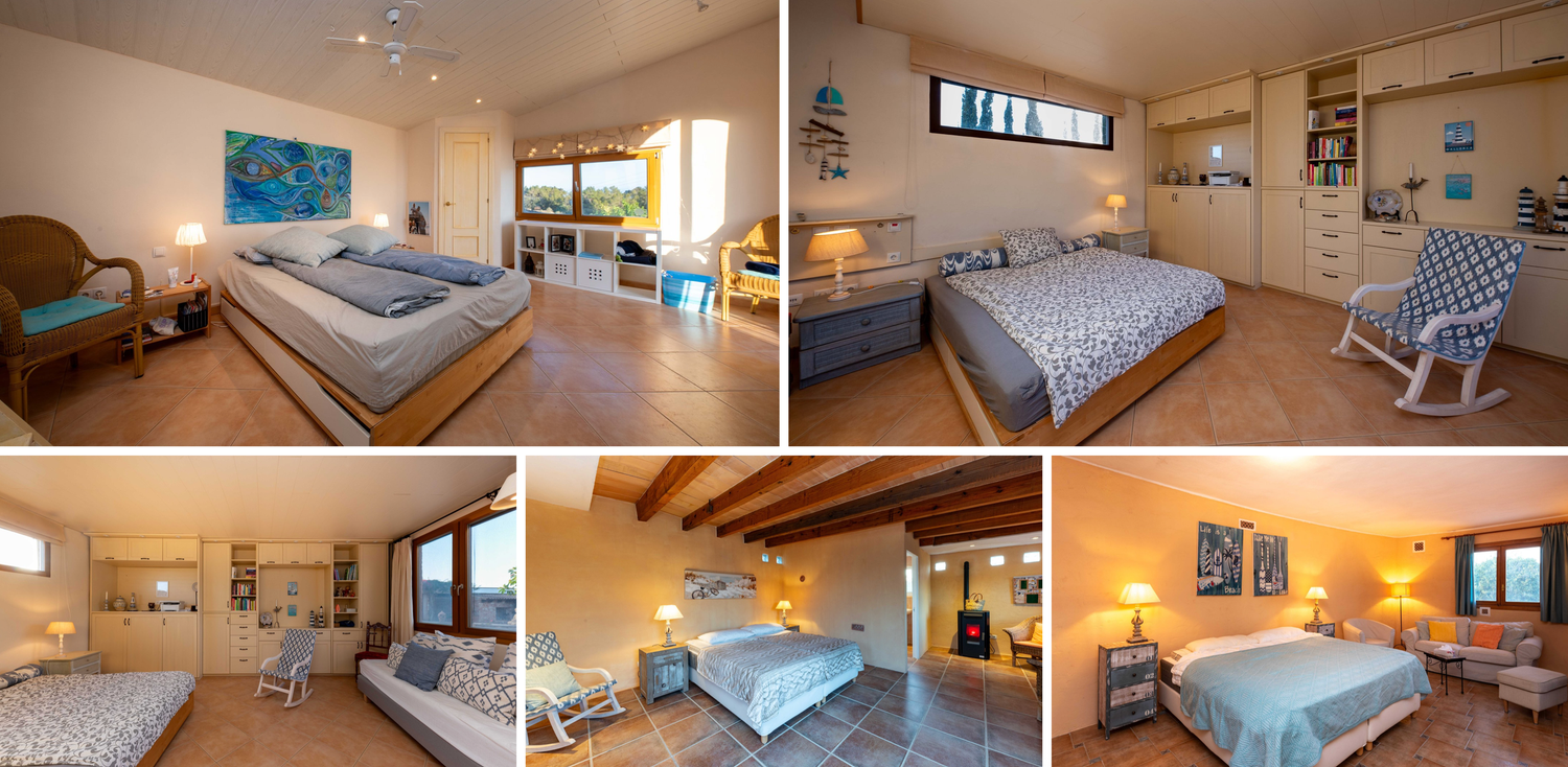 Bright coastal bedroom interior with exposed wooden beams and white bedding in a modern Mediterranean style.