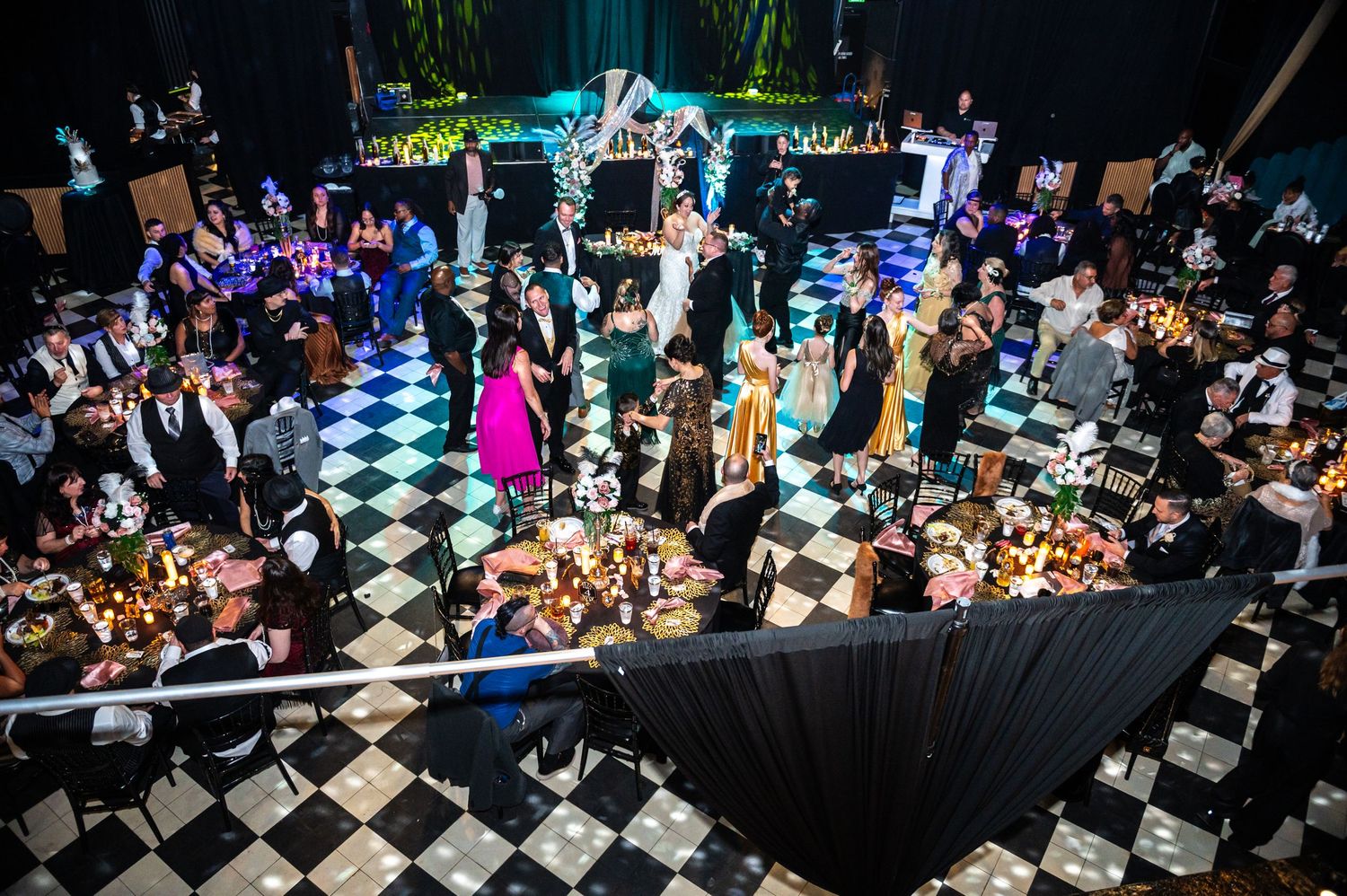 The dance floor is full of guests dancing the night away.