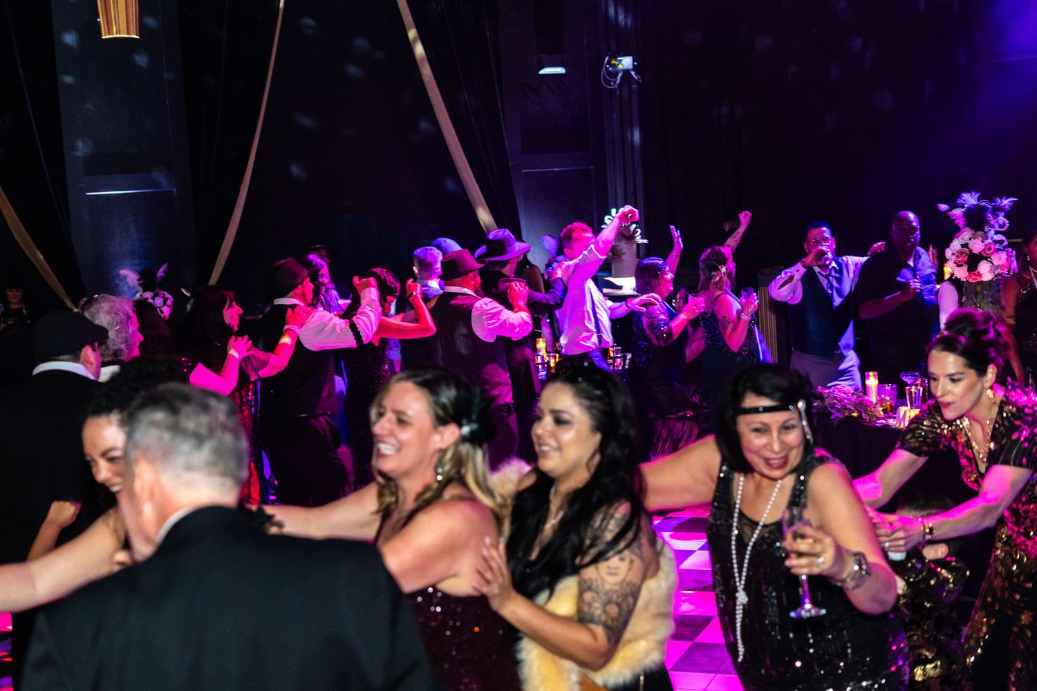 A gongo line broke out on the dance floor during the wedding reception.