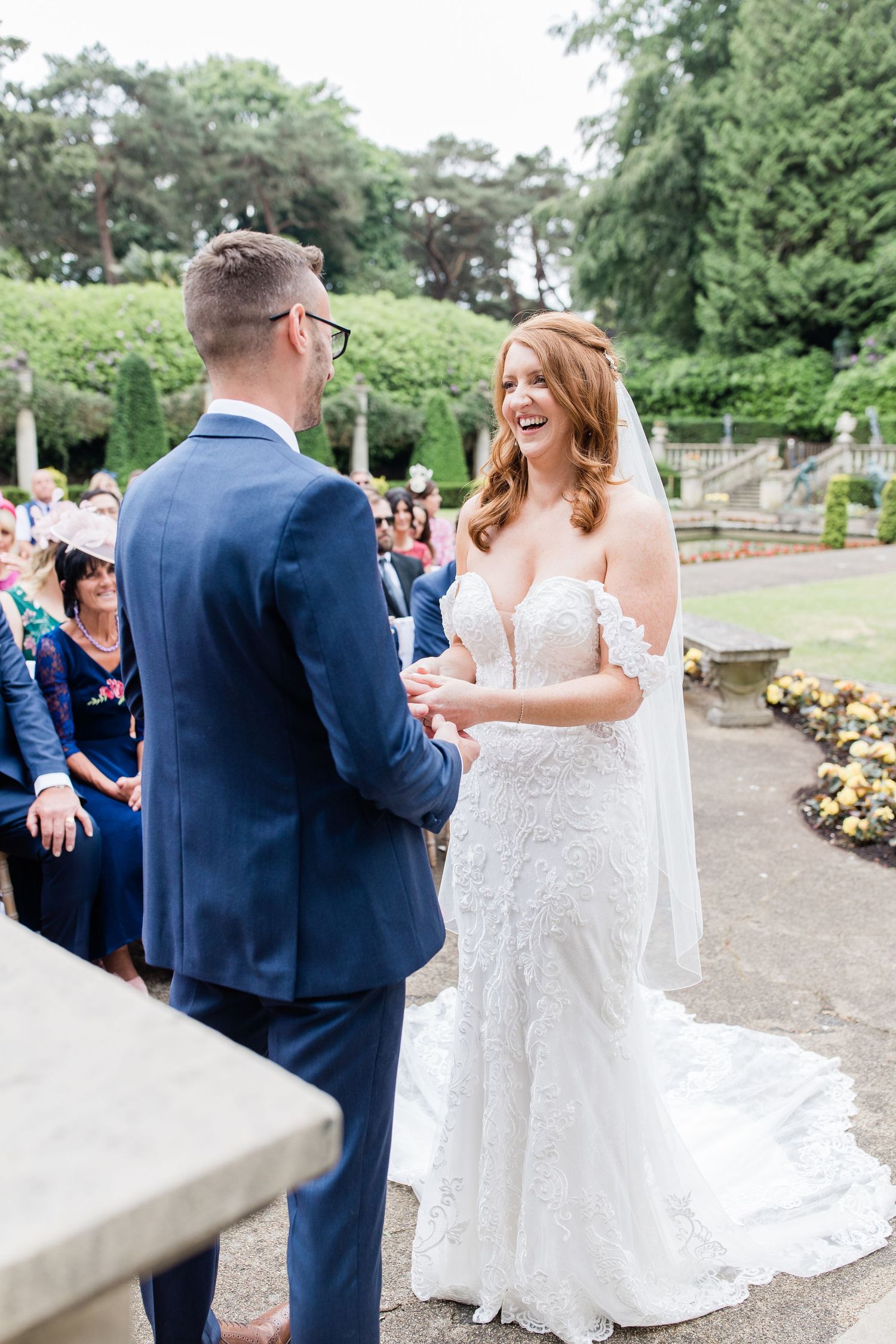 Outdoor wedding ceremony at The Italian Villa in Dorset with stone staircase, photographed by Maddie Waters Hampshire wedding photographer