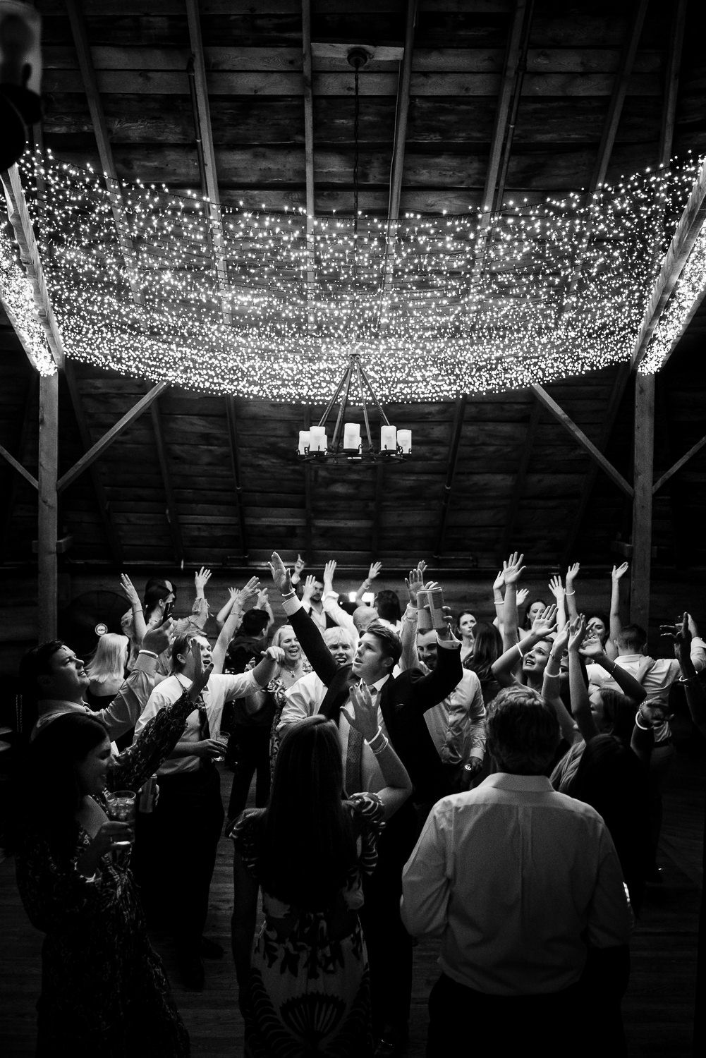 end of the night group dance at a wedding reception in an old barn in Vermont