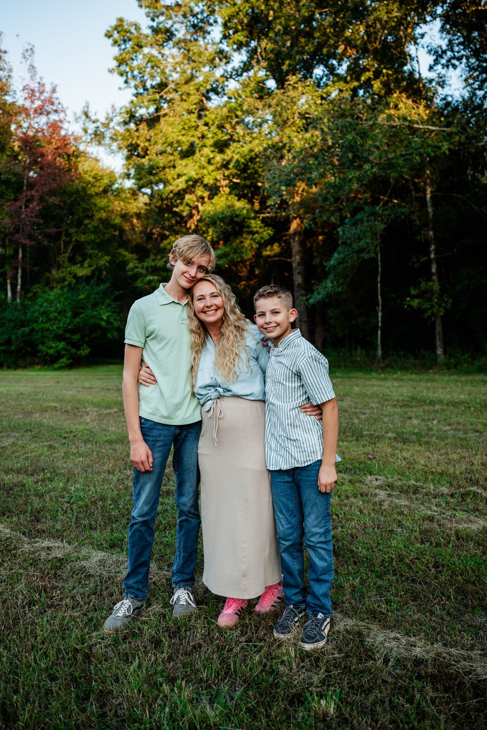 Memphis Family Portrait of mother and sons on farm in Collierville, Tennessee during golden hour.