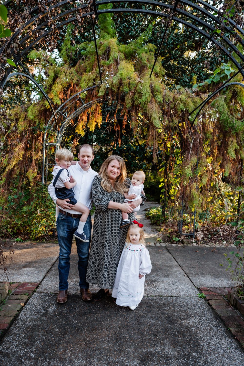 Memphis Family Portrait at Dixon Art Gallery  with chef and wife and three children during golden hour.