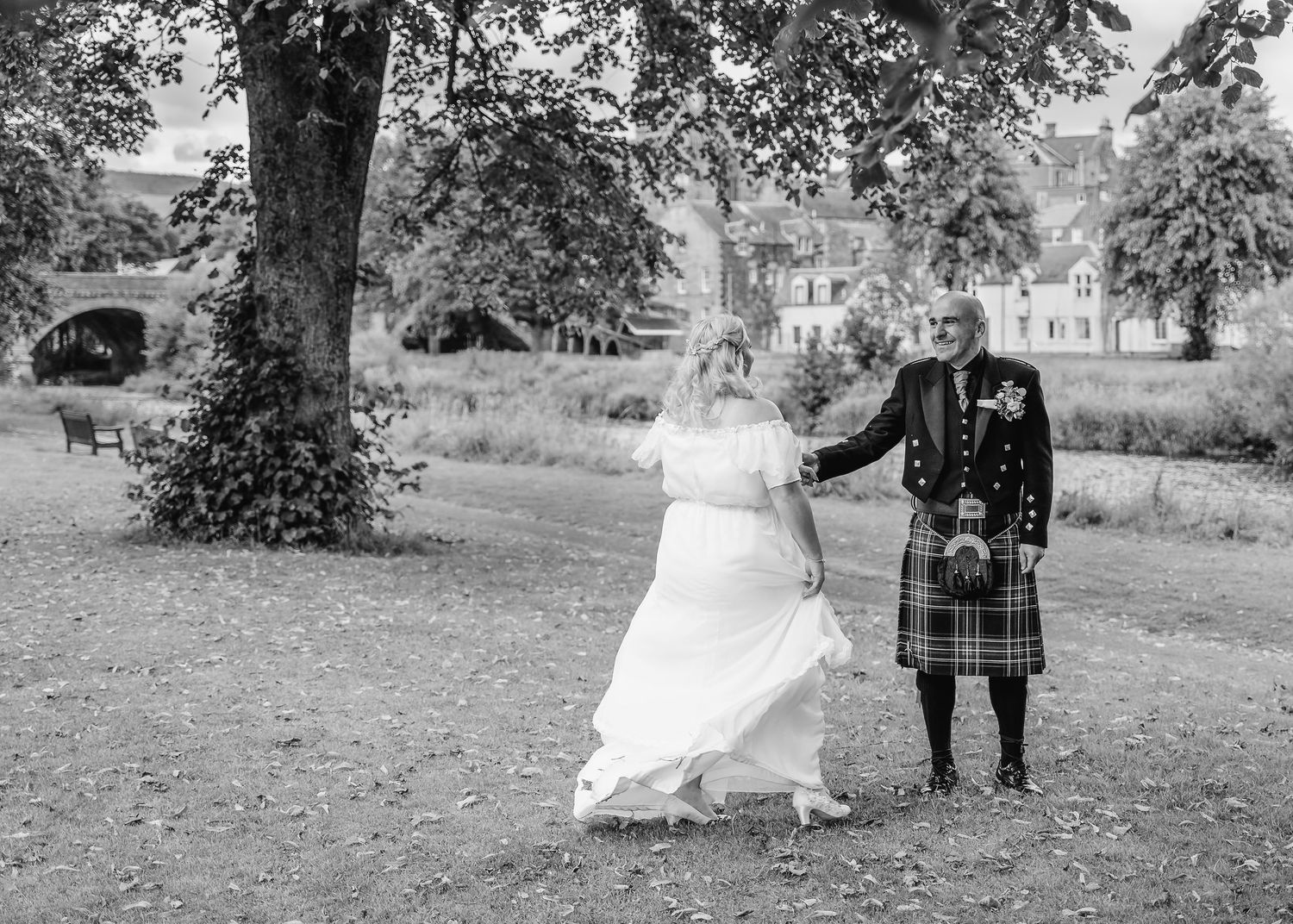 A collection of black and white wedding photos showing scenic outdoor moments at an outdoor wedding shoot in the Scottish Borders.