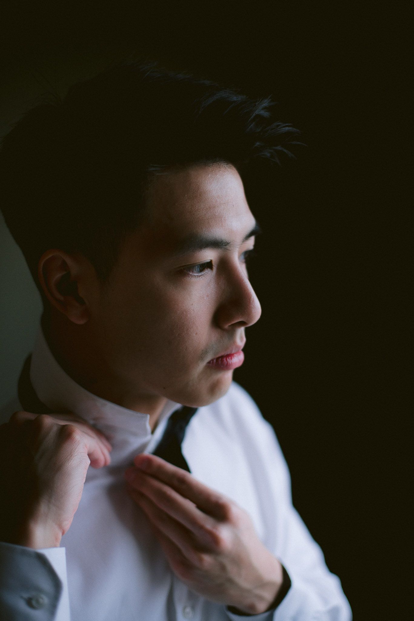 A series of dramatic side profile portraits in chiaroscuro lighting against a dark background.