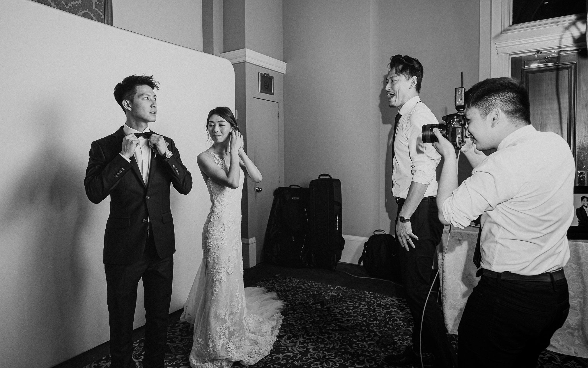 Black and white photo series showing wedding party preparations in various candid moments.