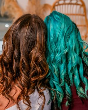 Hair transformation showing a gradient from warm brown to vibrant turquoise in a side-by-side comparison.