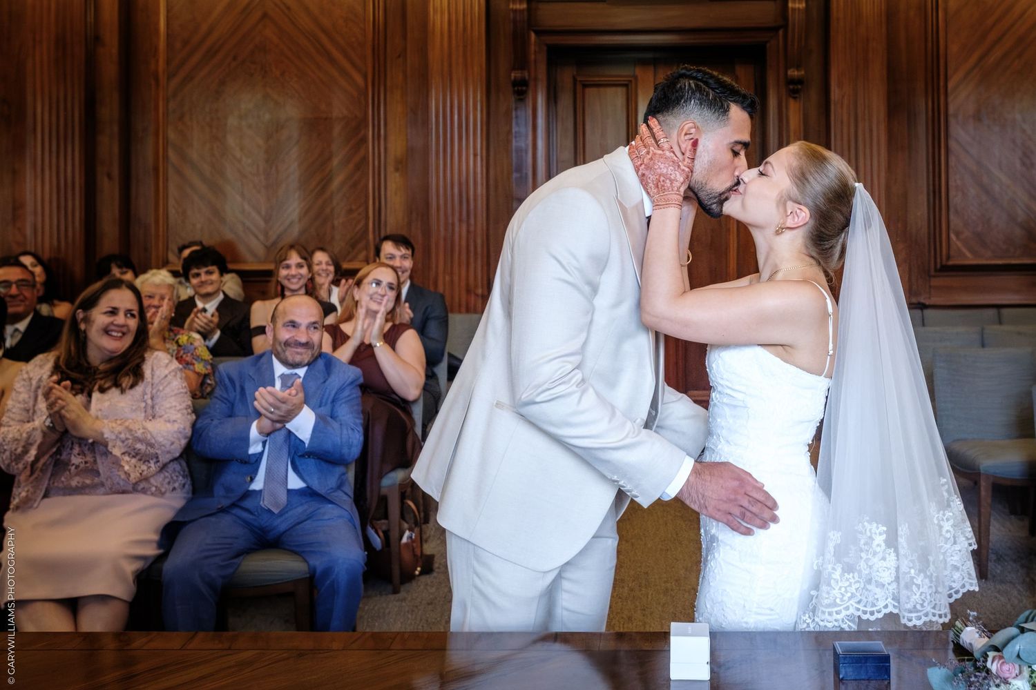 A romantic series of four wedding reception dance photos showing the couple sharing intimate moments on the dance floor.