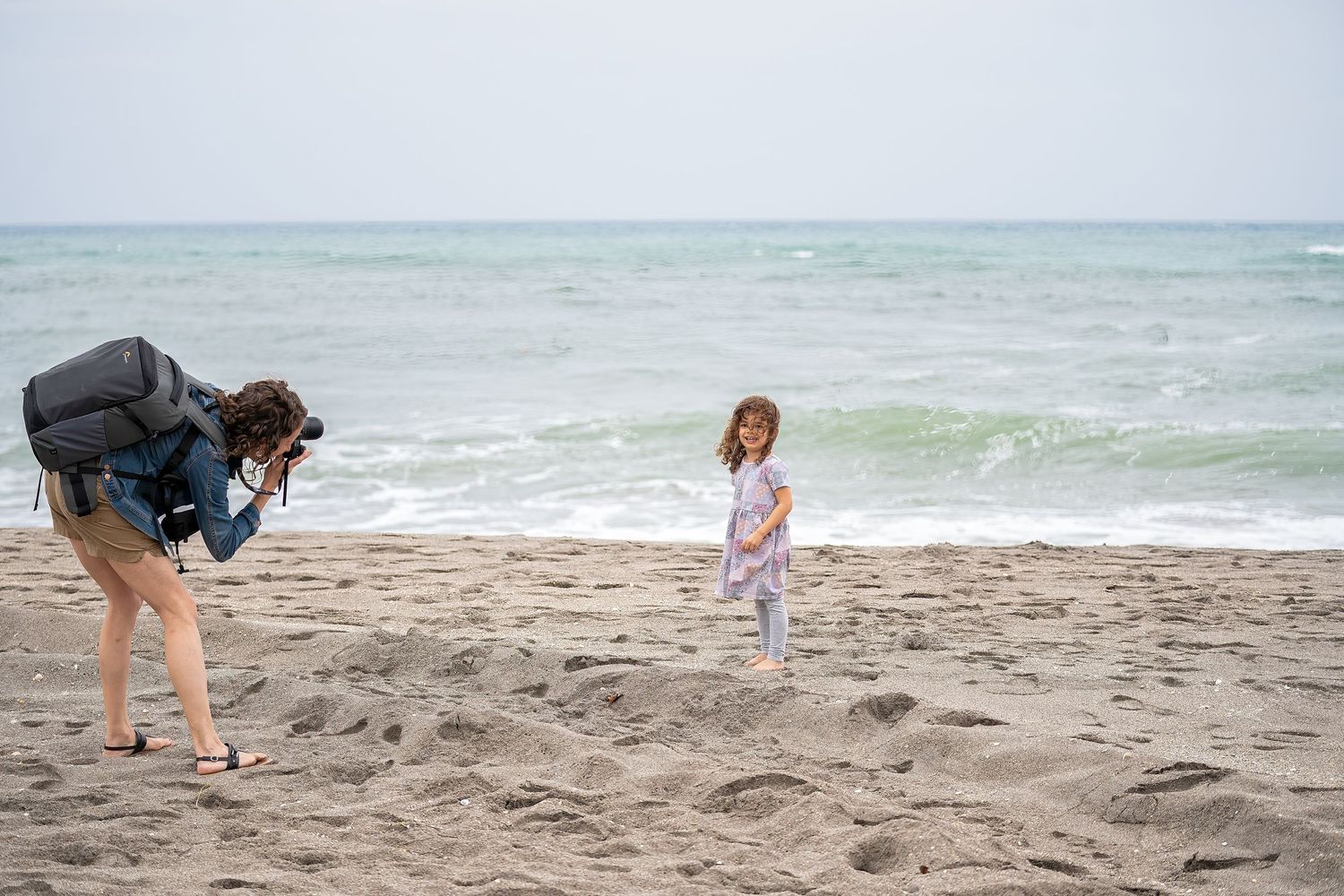 My adorable niece, Evelyn, on Jupiter Beach, being photographed by Casey Thomas Photography.