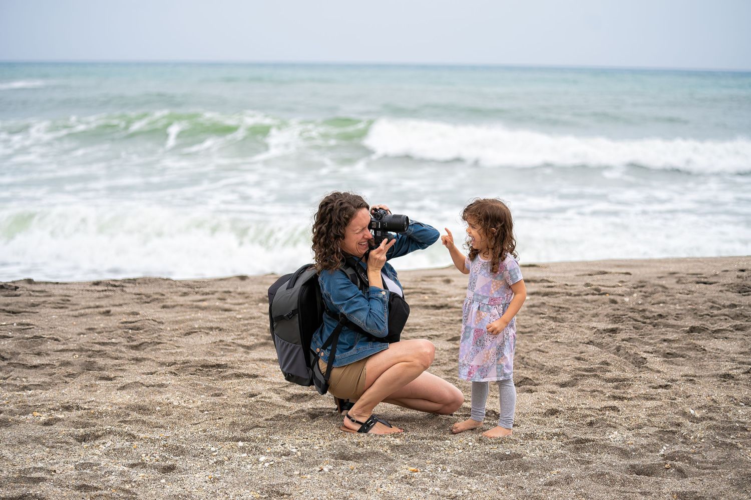 My adorable niece, Evelyn, on Jupiter Beach, being photographed by Casey Thomas Photography.
