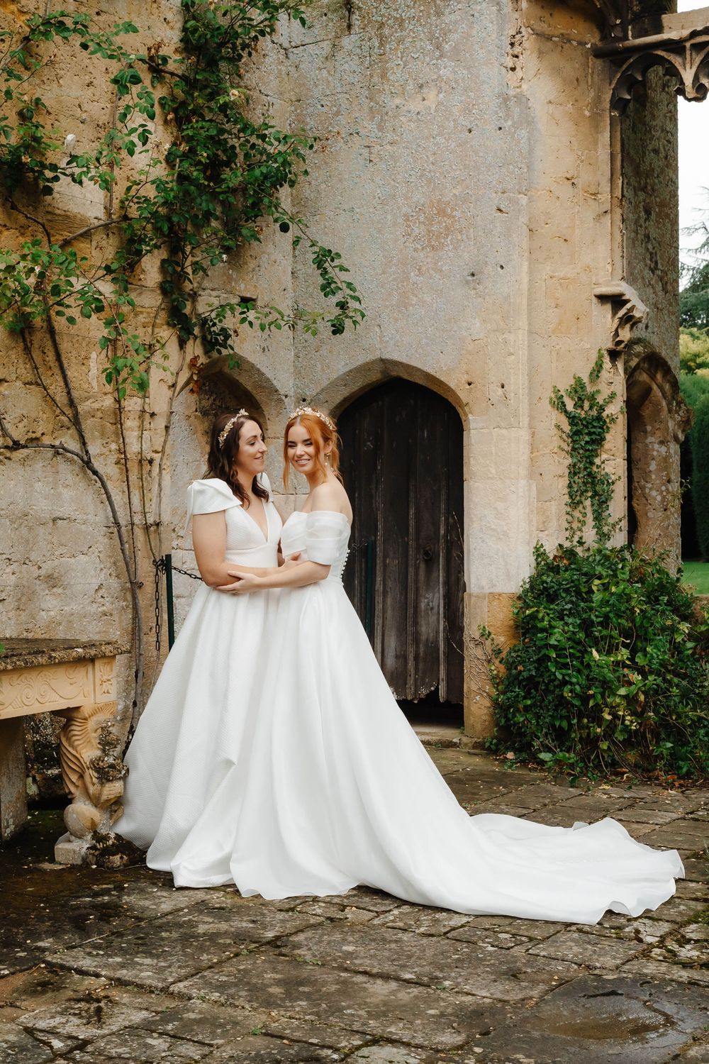 Sudeley Castle Wedding Zara Davis Photography Cotswolds Gloucestershire Photographer two brides hugging in ruins