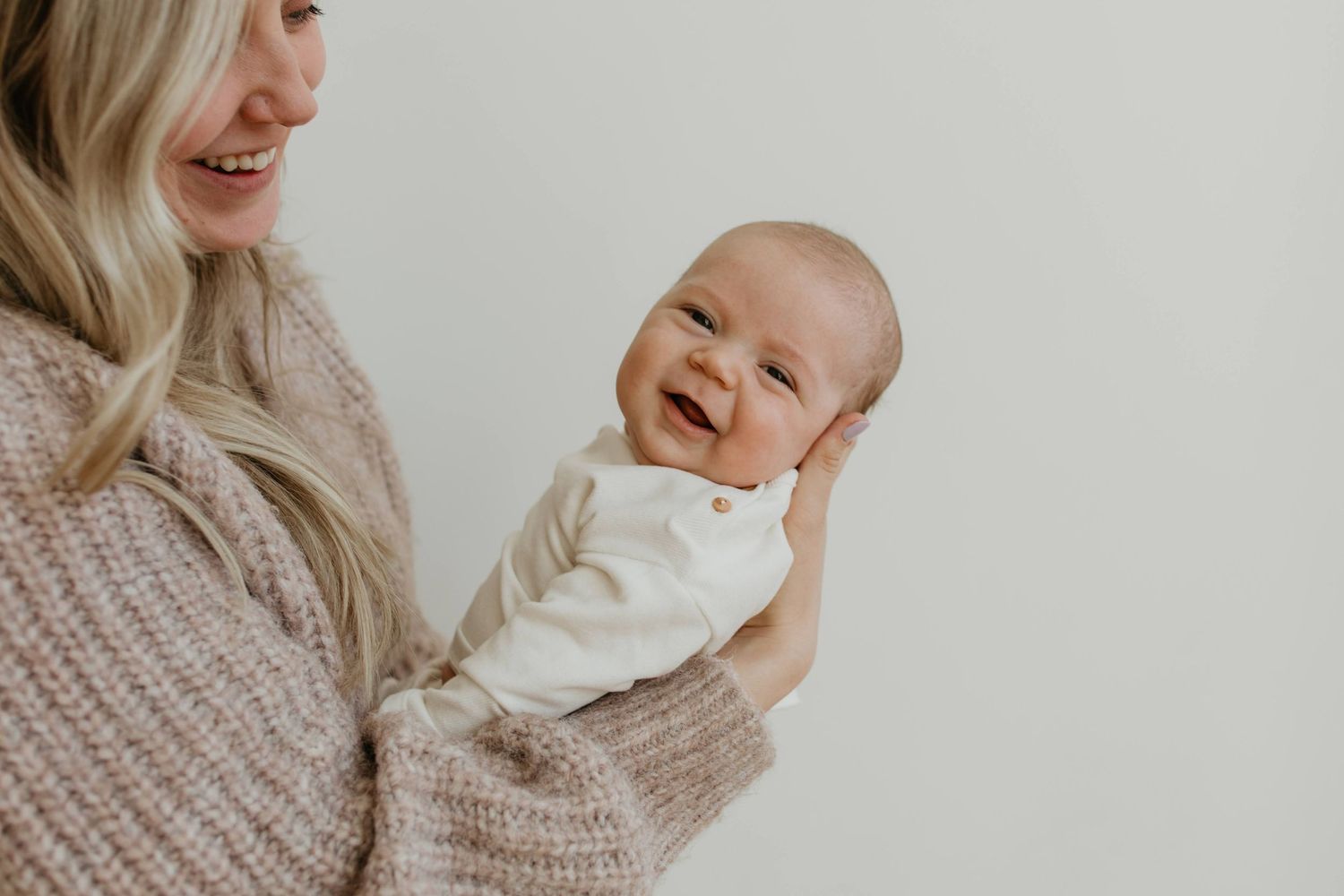 Candid lifestyle photos showing joyful moments in soft neutral tones.