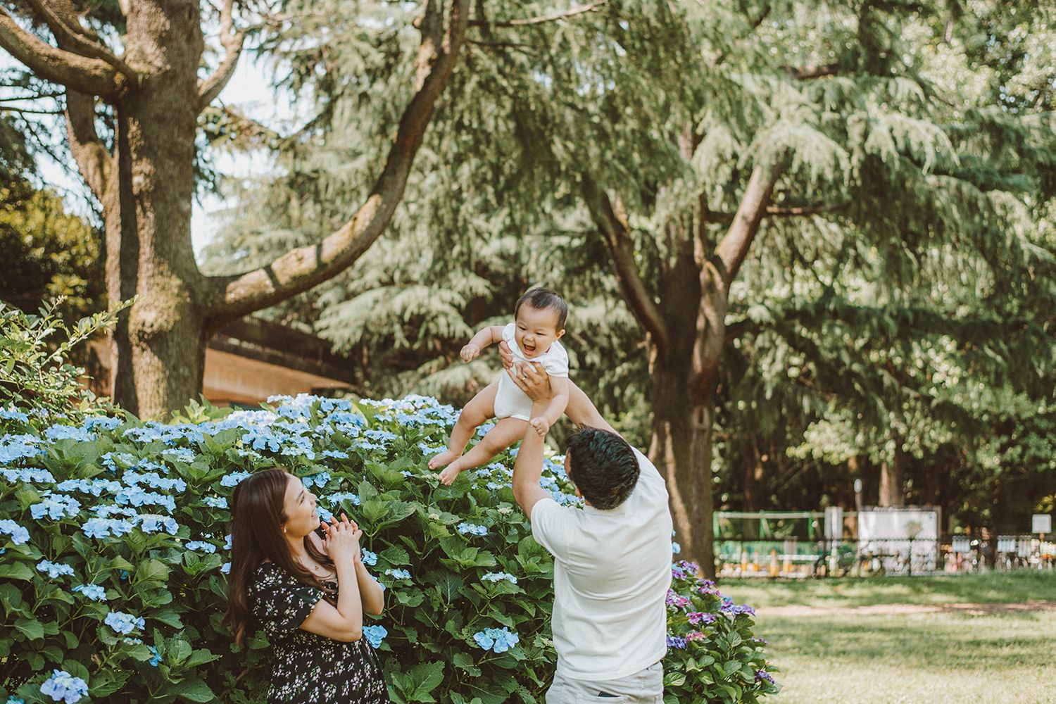 Smiling family captured with heartful photography in Tokyo vacation session by Miki Sakai Photography