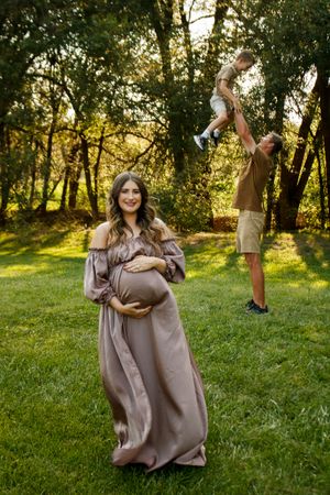 A family of three during a family photo session at The League House in Amarillo, Texas