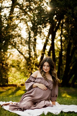 An expecting mother during a maternity photo session at The League House in Amarillo, Texas