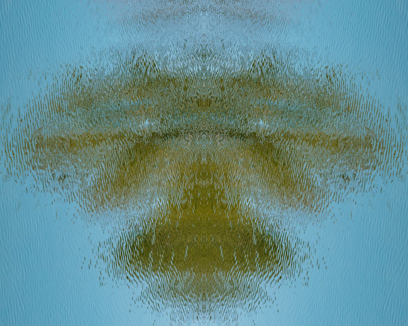 A blurred abstract golden shape resembling wings or feathers against a light blue background.