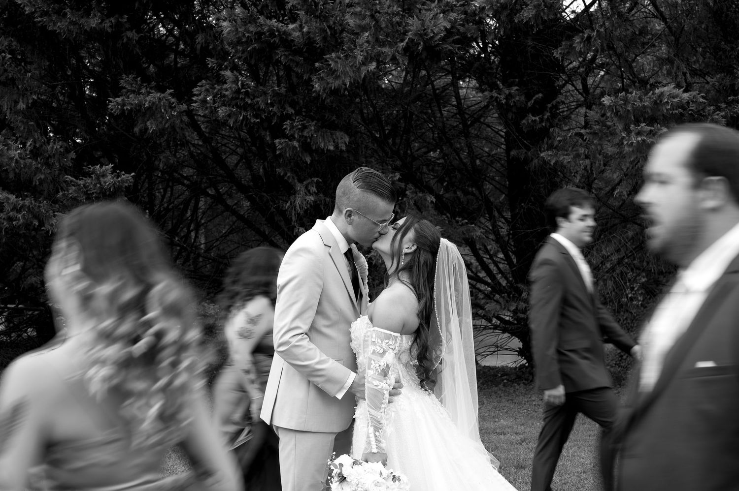 A black and white photo montage shows multiple wedding moments with couples dancing and embracing at an outdoor celebration.