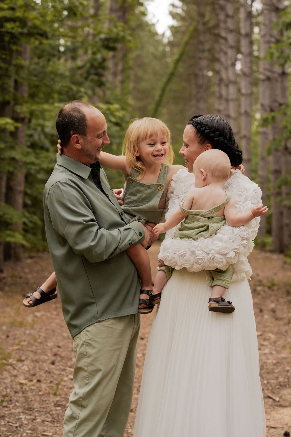 Family smiling and playing together